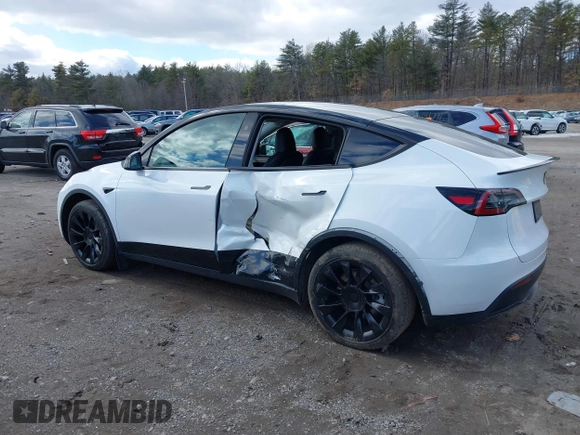 2023 Tesla Model Y Long Range with VIN 7SAYGDEE7PF832007, listed as a IAAI auction lot 41751598 with 14,126 mi miles and . Bid and sale history available at DreamBid. Image 14.