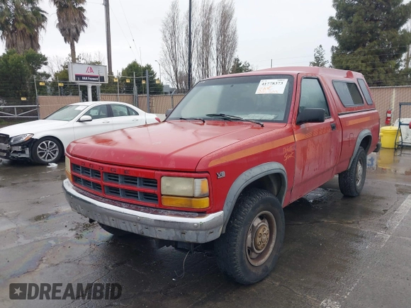 1991 Dodge Dakota z VIN 1B7GG66Y7MS210454, wystawiony jako IAAI lot #41778373 z przebiegiem 151 112 mil mil oraz . Historia ofert i sprzedaży dostępna na DreamBid. Obrazek 2.