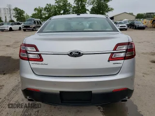 2017 Ford Taurus SEL z VIN 1FAHP2E87HG119780, wystawiony jako Copart lot #59135705 z przebiegiem 122 731 mil mil oraz Szkoda całkowita • Salvage title. Historia ofert i sprzedaży dostępna na DreamBid. Obrazek 6.