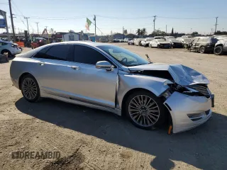 2015 Lincoln MKZ z VIN 3LN6L2G9XFR610736, wystawiony jako Copart lot #80662274 z przebiegiem 101 441 mil mil oraz Szkoda całkowita • Salvage title. Historia ofert i sprzedaży dostępna na DreamBid. Obrazek 4.
