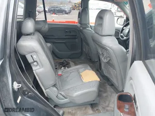 2004 Honda Pilot EX with VIN 2HKYF18644H516791, listed as a IAAI auction lot 41876348 with 291,358 mi miles. Bid and sale history available at carsss.com. Image 8.