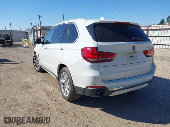 2014 BMW X5 sDrive35i with VIN 5UXKR2C53E0C01692, listed as a IAAI auction lot 41727216 with 135,985 mi miles. Bid and sale history available at carsss.com. Image 3.
