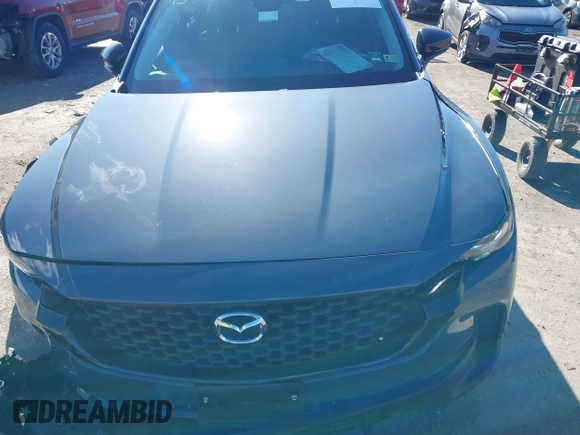 2024 Mazda CX-50 S Select with VIN 7MMVABAMXRN238079, listed as a IAAI auction lot 41563281 with 5,576 mi miles and . Bid and sale history available at DreamBid. Image 13.