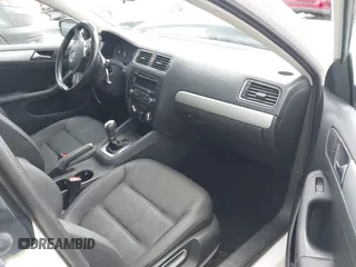 2012 Volkswagen Jetta TDI w/Premium & Nav with VIN 3VWLL7AJ8CM094552, listed as a IAAI auction lot 41962900 with 158,868 mi miles and . Bid and sale history available at DreamBid. Image 5.