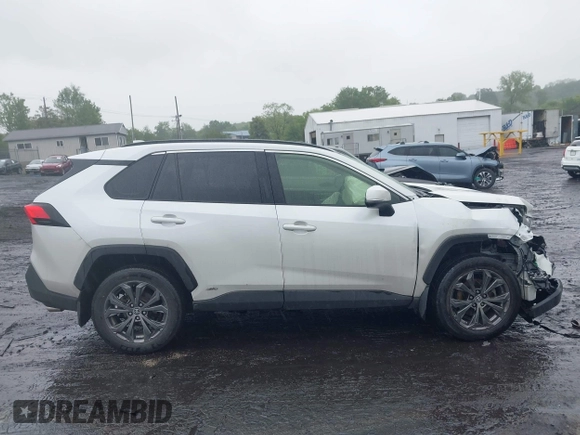 2023 Toyota RAV4 Hybrid XLE Premium z VIN JTMB6RFV3PD546700, wystawiony jako IAAI lot #42334903 z przebiegiem 53 853 mil mil oraz . Historia ofert i sprzedaży dostępna na DreamBid. Obrazek 13.