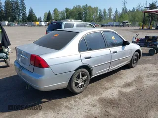 2001 Honda Civic LX with VIN 1HGES16501L014202, listed as a IAAI auction lot 42121901 with 1 mi miles. Bid and sale history available at carsss.com. Image 4.