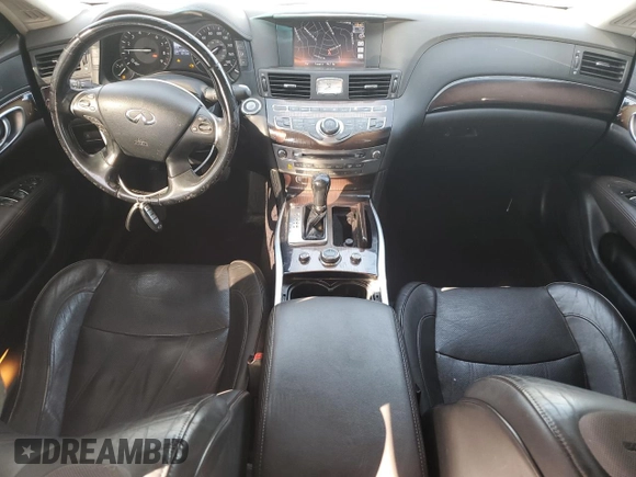 2015 Infiniti Q70 z VIN JN1BY1PR6FM830997, wystawiony jako Copart lot #41895875 z przebiegiem 203 061 mil mil oraz Szkoda całkowita • Salvage title. Historia ofert i sprzedaży dostępna na DreamBid. Obrazek 8.