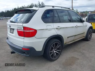 2008 BMW X5 3.0si with VIN 5UXFE43508L027587, listed as a IAAI auction lot 42054376 with 142,838 mi miles. Bid and sale history available at carsss.com. Image 4.