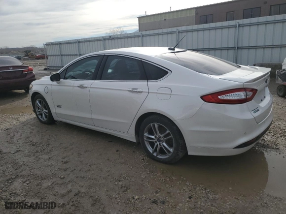 2016 Ford Fusion Energi Titanium with VIN 3FA6P0SU5GR145573, listed as a Copart auction lot 43451515 with 143,064 mi miles and Salvage Title. Bid and sale history available at carsss.com. Image 2.