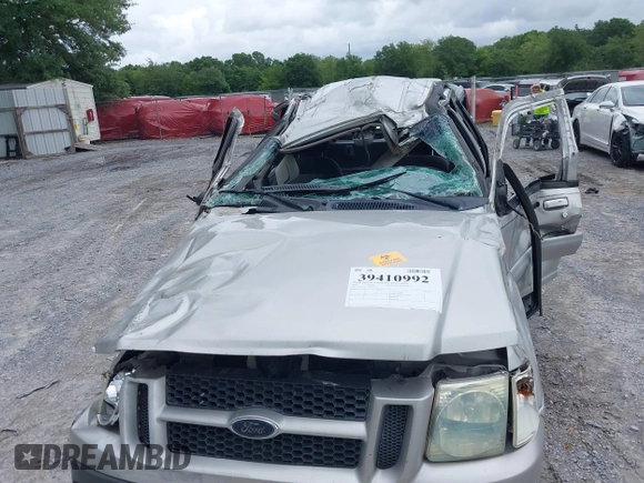 2004 Ford Explorer Sport Trac XLS with VIN 1FMZU67K14UA83504, listed as a IAAI auction lot 39410992 with Not provided miles and . Bid and sale history available at DreamBid. Image 6.