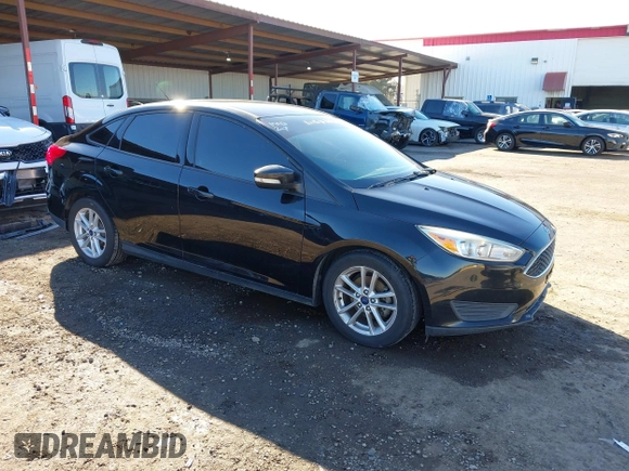 2015 Ford Focus SE with VIN 1FADP3F21FL262033, listed as a IAAI auction lot 41521714 with 101,890 mi miles. Bid and sale history available at carsss.com. Image 1.