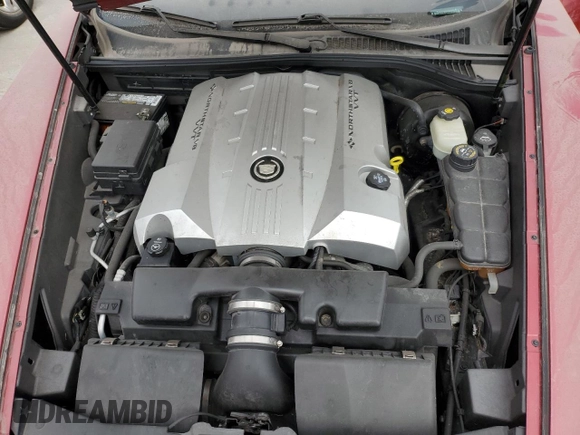 2005 Cadillac XLR z VIN 1G6YV34A855601016, wystawiony jako Copart lot #74436784 z przebiegiem Nie podano mil oraz Szkody całkowita. Historia ofert i sprzedaży dostępna na DreamBid. Obrazek 11.