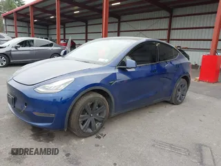 2021 Tesla Model Y Long Range with VIN 5YJYGDEE9MF071120, listed as a IAAI auction lot 40870088 with 73,438 mi miles and . Bid and sale history available at carsss.com. Image 20.