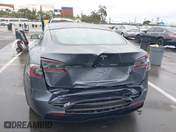 2022 Tesla Model S with VIN 5YJSA1E52NF459460, listed as a IAAI auction lot 41736236 with Not Provided miles and . Bid and sale history available at DreamBid. Image 6.