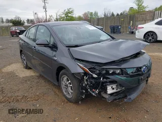 2018 Toyota Prius Plus with VIN JTDKARFP6J3078362, listed as a IAAI auction lot 42021835 with 61,170 mi miles and . Bid and sale history available at DreamBid. Image 1.