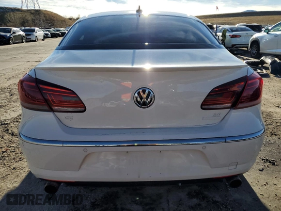 2014 Volkswagen CC VR6 Executive 4Motion with VIN WVWGU7AN4EE531587, listed as a Copart auction lot 79768104 with 77,333 mi miles and Salvage Title. Bid and sale history available at carsss.com. Image 6.