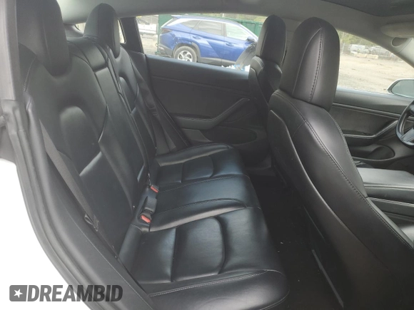 2018 Tesla Model 3 Long Range Battery with VIN 5YJ3E1EAXJF165000, listed as a Copart auction lot 53806195 with 140,448 mi miles and Clean Title. Bid and sale history available at DreamBid. Image 10.