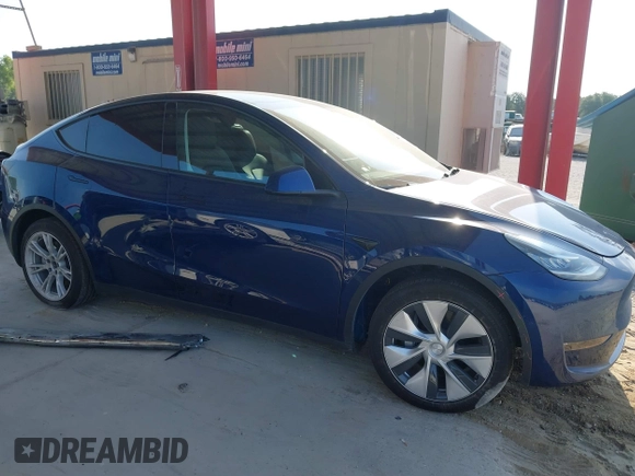 2022 Tesla Model Y Long Range z VIN 7SAYGAEE2NF364733, wystawiony jako IAAI lot #42290231 z przebiegiem 33 907 mil mil oraz . Historia ofert i sprzedaży dostępna na DreamBid. Obrazek 13.