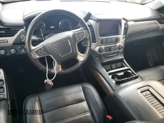 2018 GMC Yukon Denali with VIN 1GKS2CKJ4JR161009, listed as a Copart auction lot 74598914 with 106,891 mi miles and Salvage Title. Bid and sale history available at carsss.com. Image 8.