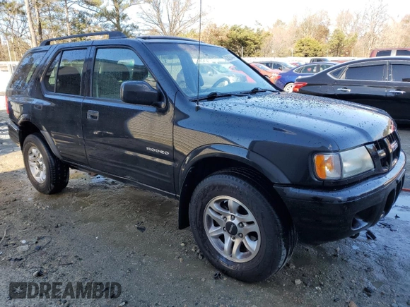 2003 Isuzu Rodeo with VIN 4S2CK58W334306303, listed as a Copart auction lot 83820444 with 180,040 mi miles and Salvage Title. Bid and sale history available at DreamBid. Image 4.