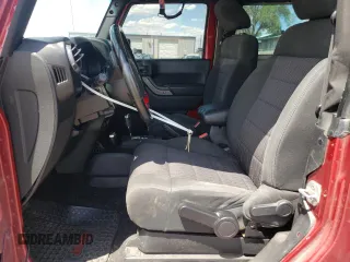 2012 Jeep Wrangler Sport with VIN 1C4GJWAG6CL114615, listed as a Copart auction lot 55355045 with 158,342 mi miles and Salvage title. Bid and sale history available at DreamBid. Image 7.