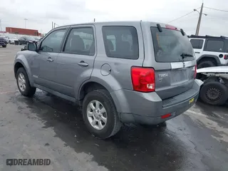 2008 Mazda Tribute Sport with VIN 4F2CZ02Z28KM31700, listed as a IAAI auction lot 41736309 with 235,848 mi miles. Bid and sale history available at carsss.com. Image 3.