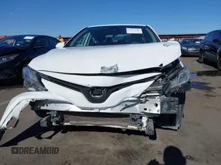 2019 Toyota Camry LE with VIN 4T1B11HK3KU772369, listed as a IAAI auction lot 41353103 with 85,565 mi miles and . Bid and sale history available at DreamBid. Image 6.