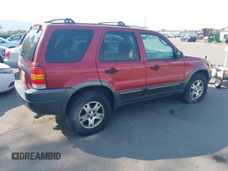 2004 Ford Escape XLT with VIN 1FMYU93114KB38538, listed as a IAAI auction lot 42678317 with 180,106 mi miles and . Bid and sale history available at DreamBid. Image 4.