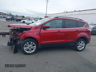 2018 Ford Escape SE z VIN 1FMCU9GD8JUB14803, wystawiony jako IAAI lot #41842056 z przebiegiem 50 712 mil mil oraz . Historia ofert i sprzedaży dostępna na DreamBid. Obrazek 15.