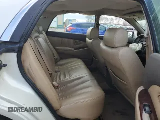 2002 Mitsubishi Diamante LS z VIN 6MMAP67P62T018175, wystawiony jako Copart lot #52052285 z przebiegiem 182 739 mil mil oraz Szkoda całkowita • Salvage title. Historia ofert i sprzedaży dostępna na DreamBid. Obrazek 10.