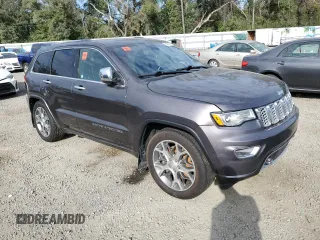 2021 Jeep Grand Cherokee Overland with VIN 1C4RJFCG9MC620320, listed as a Copart auction lot 85609814 with 61,335 mi miles and Salvage title. Bid and sale history available at DreamBid. Image 4.
