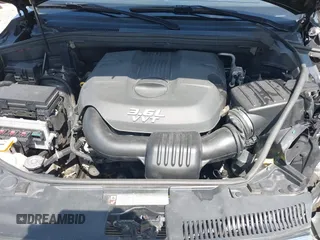 2013 Dodge Durango SXT with VIN 1C4RDJAG7DC580249, listed as a IAAI auction lot 42535723 with 199,626 mi miles and . Bid and sale history available at DreamBid. Image 10.