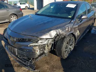 2020 Toyota Camry LE with VIN 4T1C11AKXLU884764, listed as a IAAI auction lot 40821088 with 111,631 mi miles. Bid and sale history available at carsss.com. Image 6.