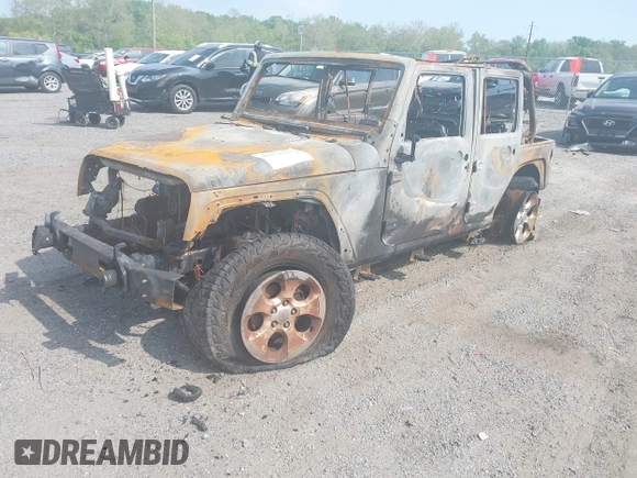 2013 Jeep Wrangler Unlimited Sahara with VIN 1C4BJWEG6DL551696, listed as a IAAI auction lot 42171223 with 164,927 mi miles and . Bid and sale history available at DreamBid. Image 2.