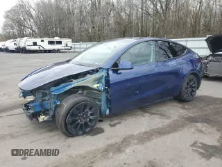 2023 Tesla Model Y Long Range z VIN 7SAYGDEE8PA028179, wystawiony jako Copart lot #52022535 z przebiegiem 19 973 mil mil oraz Szkoda całkowita • Salvage title. Historia ofert i sprzedaży dostępna na DreamBid. Obrazek 1.