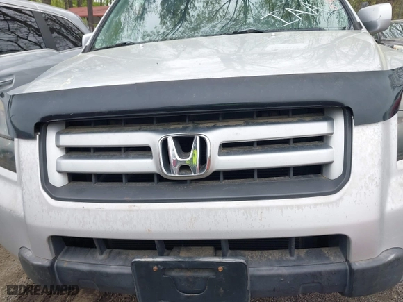 2006 Honda Pilot EX-L with RES with VIN 5FNYF286X6B043597, listed as a IAAI auction lot 41940460 with 325,118 mi miles. Bid and sale history available at carsss.com. Image 10.