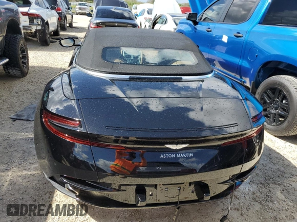 2019 Aston Martin DB11 z VIN SCFRMFCW9KGM05896, wystawiony jako Copart lot #78158154 z przebiegiem Nie podano mil oraz Nie do naprawy. Historia ofert i sprzedaży dostępna na DreamBid. Obrazek 6.