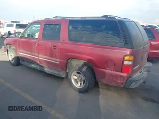 2003 Chevrolet Suburban LT z VIN 1GNFK16Z43J310271, wystawiony jako IAAI lot #41699310 z przebiegiem 232 680 mil mil oraz . Historia ofert i sprzedaży dostępna na DreamBid. Obrazek 3.