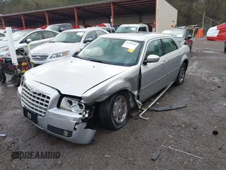 2006 Chrysler 300 Touring with VIN 2C3KA53G66H532518, listed as a IAAI auction lot 41356230 with 203,605 mi miles. Bid and sale history available at carsss.com. Image 16.