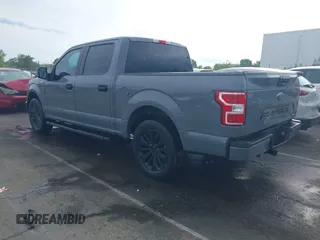 2020 Ford F-150 XL with VIN 1FTEW1CPXLKD05369, listed as a IAAI auction lot 42082934 with 64,954 mi miles and . Bid and sale history available at DreamBid. Image 3.