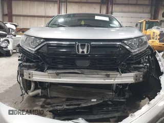 2020 Honda CR-V EX with VIN 2HKRW2H59LH682207, listed as a IAAI auction lot 42277272 with 84,994 mi miles and . Bid and sale history available at DreamBid. Image 6.