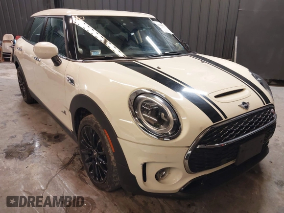 2023 MINI Clubman Cooper S with VIN WMWXJ1C02P2S77645, listed as a IAAI auction lot 41300674 with 34,302 mi miles. Bid and sale history available at carsss.com. Image 1.
