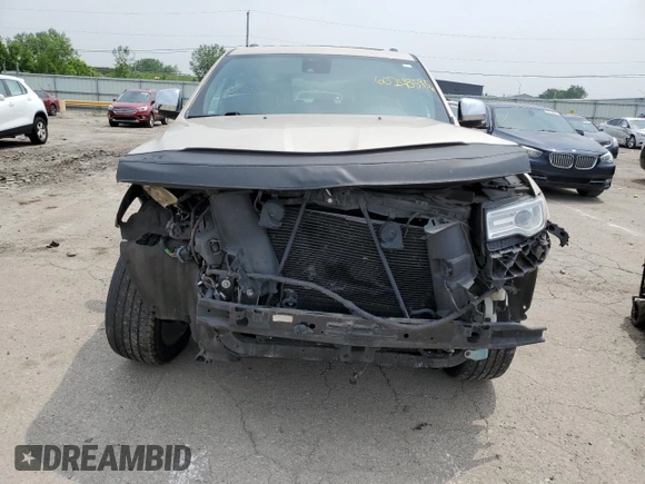 2014 Jeep Grand Cherokee Summit с VIN 1C4RJFJGXEC436797, выставлен на аукционе Copart как лот 60248595 с пробегом 156 395 миль миль и Списание • Salvage title. История ставок и продаж доступна на DreamBid. Изображение 5.