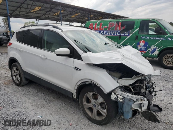 2014 Ford Escape SE z VIN 1FMCU9GX2EUC85787, wystawiony jako Copart lot #52739085 z przebiegiem 123 641 mil mil oraz Szkoda całkowita • Salvage title. Historia ofert i sprzedaży dostępna na DreamBid. Obrazek 4.