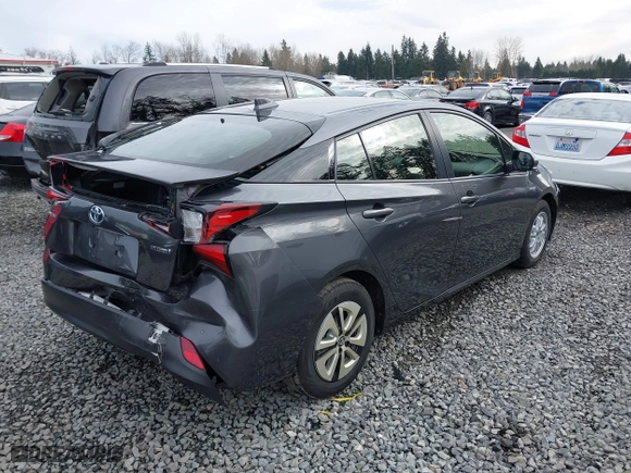 2021 Toyota Prius L Eco with VIN JTDKAMFU2M3143138, listed as a IAAI auction lot 41658263 with 102,718 mi miles. Bid and sale history available at carsss.com. Image 4.