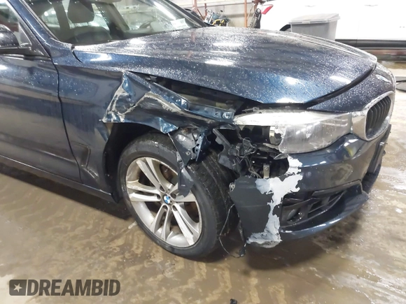 2014 BMW 3 Series 328i Gran Turismo xDrive with VIN WBA3X5C5XED557668, listed as a IAAI auction lot 41728522 with 123,393 mi miles and . Bid and sale history available at DreamBid. Image 6.