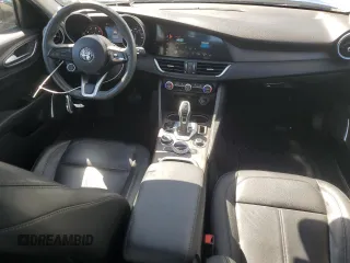 2020 Alfa Romeo Giulia Ti z VIN ZARFANBN0L7633662, wystawiony jako Copart lot #49738675 z przebiegiem 37 698 mil mil oraz Szkody całkowita. Historia ofert i sprzedaży dostępna na DreamBid. Obrazek 8.