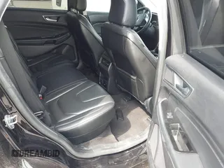 2020 Ford Edge Titanium z VIN 2FMPK3K92LBB24713, wystawiony jako IAAI lot #41949412 z przebiegiem 97 014 mil mil oraz . Historia ofert i sprzedaży dostępna na DreamBid. Obrazek 8.