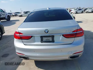 2016 BMW 7 Series 740i with VIN WBA7E2C5XGG739099, listed as a IAAI auction lot 41526038 with 123,900 mi miles. Bid and sale history available at carsss.com. Image 16.