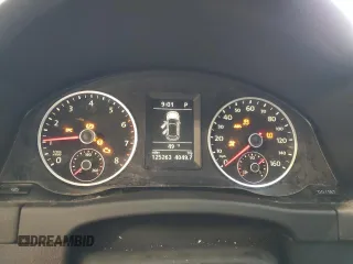 2011 Volkswagen Tiguan SEL z VIN WVGBV7AXXBW559663, wystawiony jako Copart lot #52307905 z przebiegiem 125 263 mil mil oraz Szkoda całkowita • Salvage title. Historia ofert i sprzedaży dostępna na DreamBid. Obrazek 9.